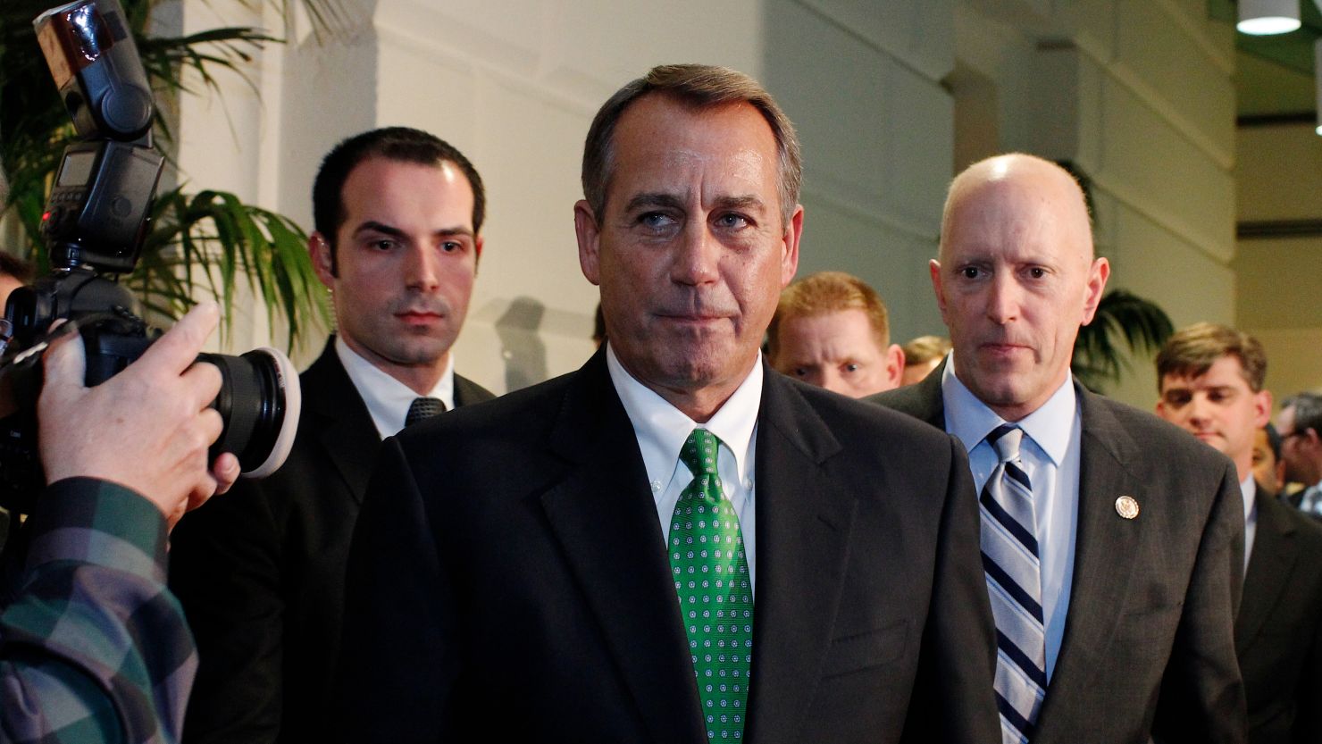House Speaker John Boehner walks out after a second meeting with House Republicans January 1 over the fiscal cliff deal.
