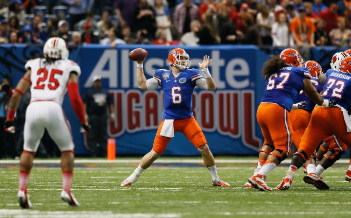 Jeff Driskel of the Florida Gators looks to pass against the Louisville Cardinals during the first quarter on January 2.