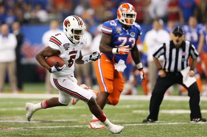 Quarterback Teddy Bridgewater of the Louisville Cardinals runs the ball in the first quarter against the Florida Gators during the Allstate Sugar Bowl at Mercedes-Benz Superdome on Wednesday, January 2, in New Orleans.
