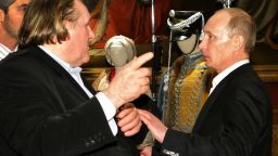 (File) Photo taken on December 11, 2010, shows Vladimir Putin (R) speaking with French actor Gerard Depardieu in St. Petersburg.