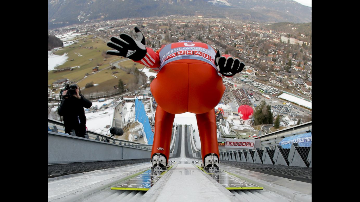 Dimitry Vassiliev of Russia begins his run on Tuesday, January 1, in Garmisch-Partenkirchen, Germany.