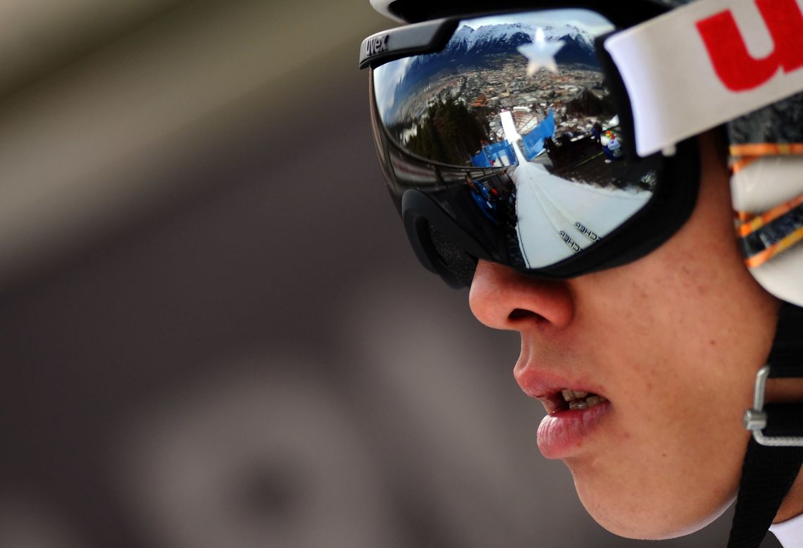 The path ahead is reflected in the goggles of Taku Takeuchi of Japan during the training round in Innsbruck, Austria, on January 3.