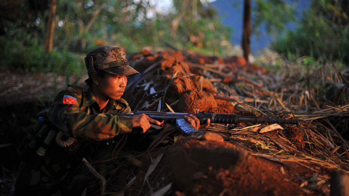 (File) A soldier from All Burma Students Democratic Front - Northern Burma, an ally of KIA on September 22, 2012.