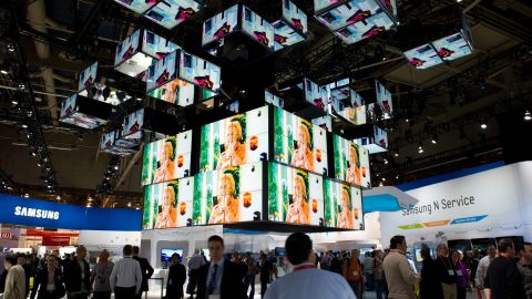 Attendees walk through the Samsung booth at last year's International Consumer Electronics Show in Las Vegas.