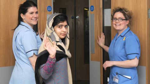 Malala Yousafzai leaves a hospital Friday in Birmingham, England. She was treated there after the Taliban shot her in the head.