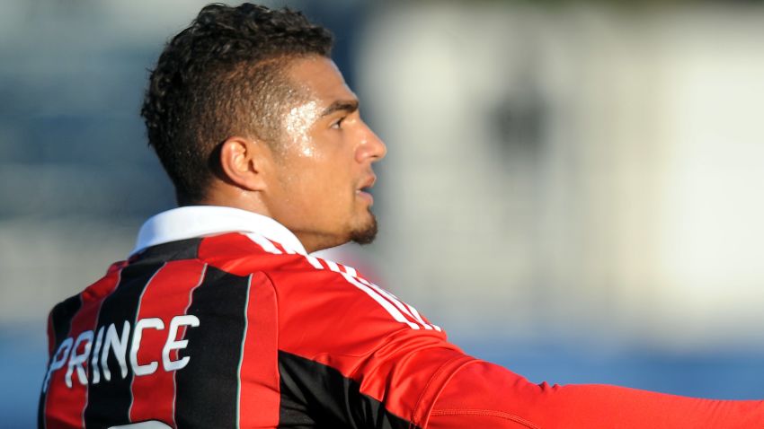 Ac Milan's Ghanaian defender Prince Kevin Boateng reacts during the friendly football match between Pro Patria and Ac Milan in Busto Arsizio on January 3, 2013. Boateng stormed off the pitch after racist chants from a group of fans on Thursday, forcing a friendly away game against fourth-tier club Pro Patria to be suspended. 'Shame that these things still happen,' the 25-year-old German-born Ghanaian player said on his Twitter account after the match was stopped in the 26th minute when he led his team off the pitch. Boateng picked up the ball, kicked it towards the stands and walked off the pitch in Pro Patria's home town of Busto Arsizio near Milan. AFP PHOTO / ALBERTO LINGRIA (Photo credit should read ) 