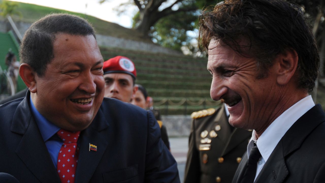 Chavez, left, jokes with American actor Sean Penn, right, during his visit to Miraflores presidential palace in Caracas on February 16, 2012. Penn thanked Chavez for the support given by the Venezuelan government to his nongovernmental organization, which benefits victims of the 2010 Haiti earthquake.