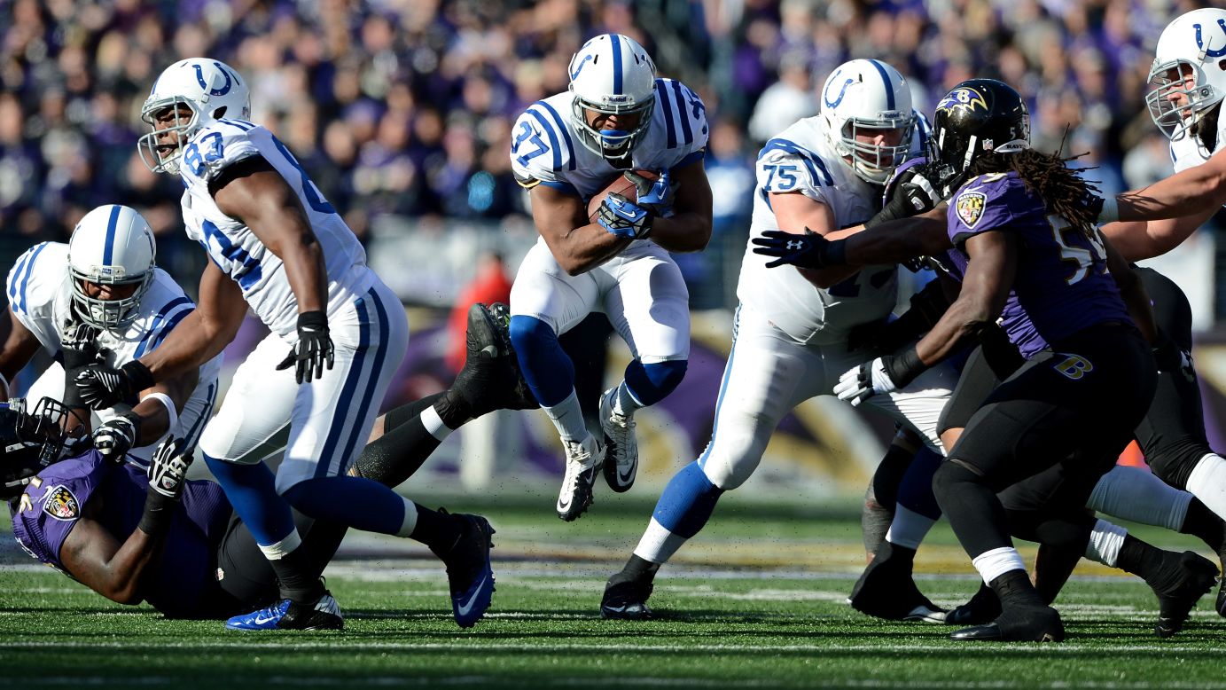Mewelde Moore of the Indianapolis Colts runs the ball in the first half against the Baltimore Ravens during the AFC Wild Card Playoff Game at M&T Bank Stadium on Sunday, January 6, in Baltimore.