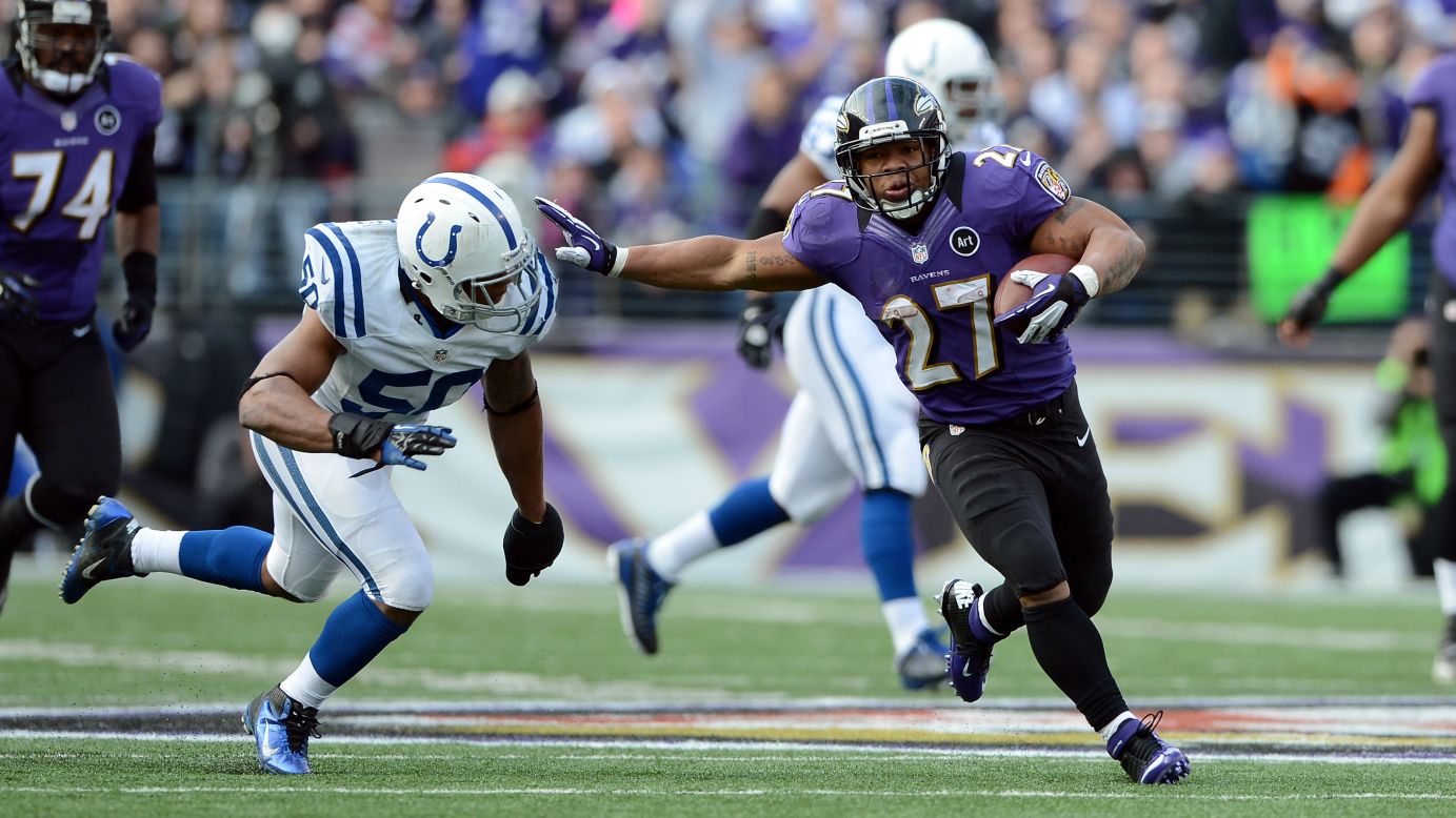 Ray Rice of the Baltimore Ravens runs the ball against Jerrell Freeman of the Indianapolis Colts on Sunday.