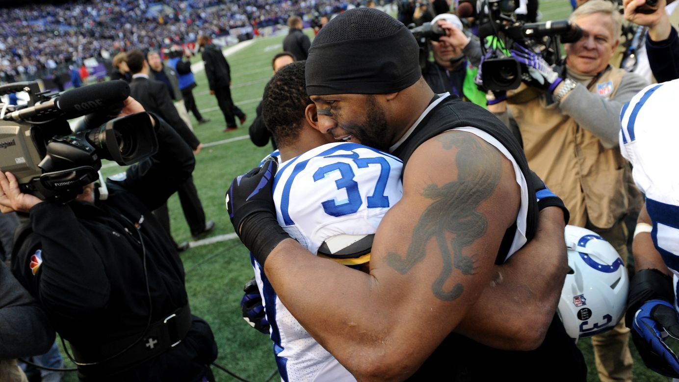Mewelde Moore, left, of the Indianapolis Colts congratulates Ray Lewis of the Baltimore Ravens after the Ravens won 24-9 during the AFC Wild Card Playoff Game on Sunday.