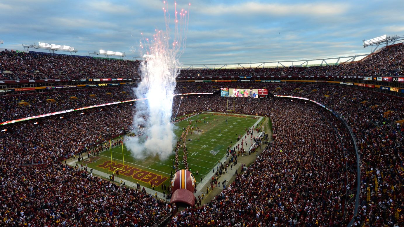 Fireworks are displayed as No. 10 Robert Griffin III of the Washington Redskins is introduced before the NFC Wild Card Playoff Game against the Seattle Seahawks on Sunday.