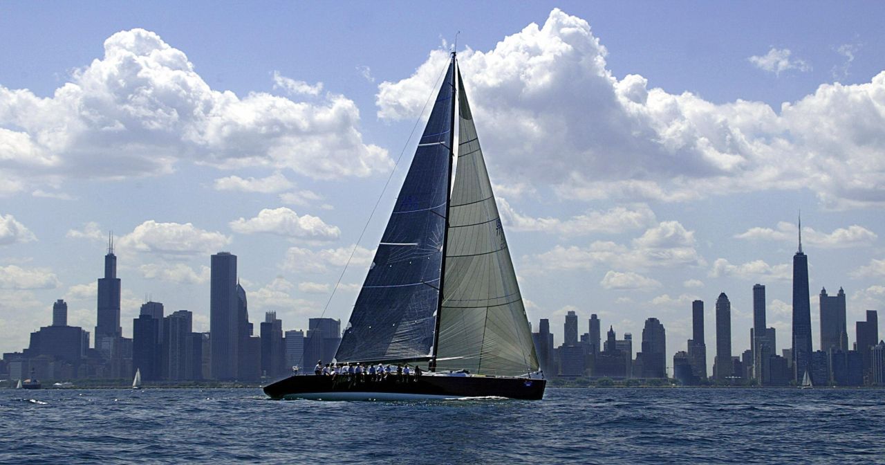A yacht sets sail on the waters of Lake Michigan with the Chicago's spectacular skyline in the background. 