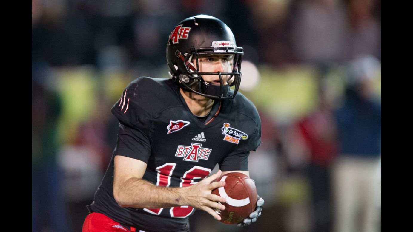 Arkansas State quarterback Ryan Aplin looks downfield for an open player during the GoDaddy.com Bowl on January 6.