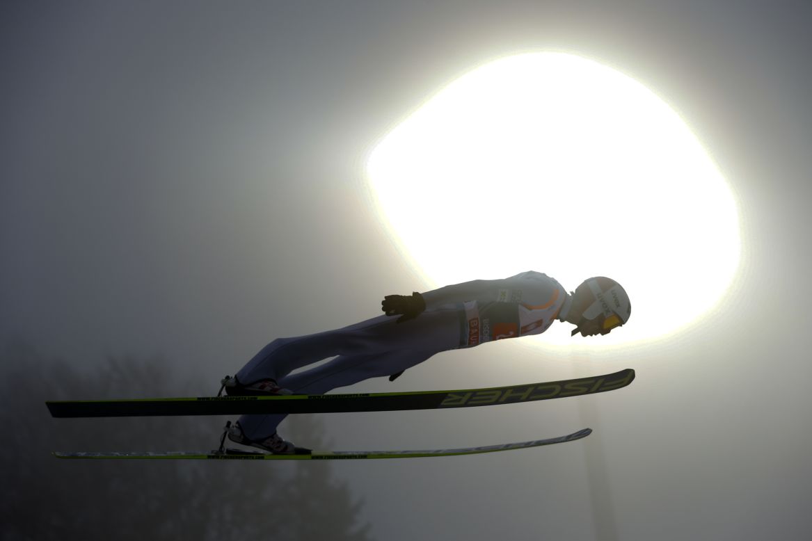Kamil Stoch of Poland makes a jump during the FIS Ski Jumping World Cup Four Hills Tournament on Sunday, January 6, in Bischofshofen, Austria. Participants compete in four events and earn points toward the World Cup. The competition began in Germany on December 29 and ended Sunday in Bischofshofen.
