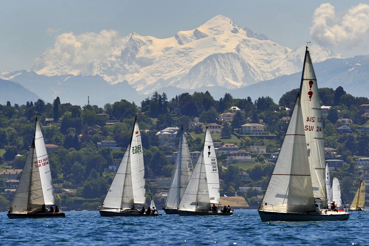 Boats race on Lake Geneva in the shadow of Mont Blanc, Europe's highest peak. Every year, Lake Geneva hosts the Bol d'Or race, one of the most important inland regattas in the world.