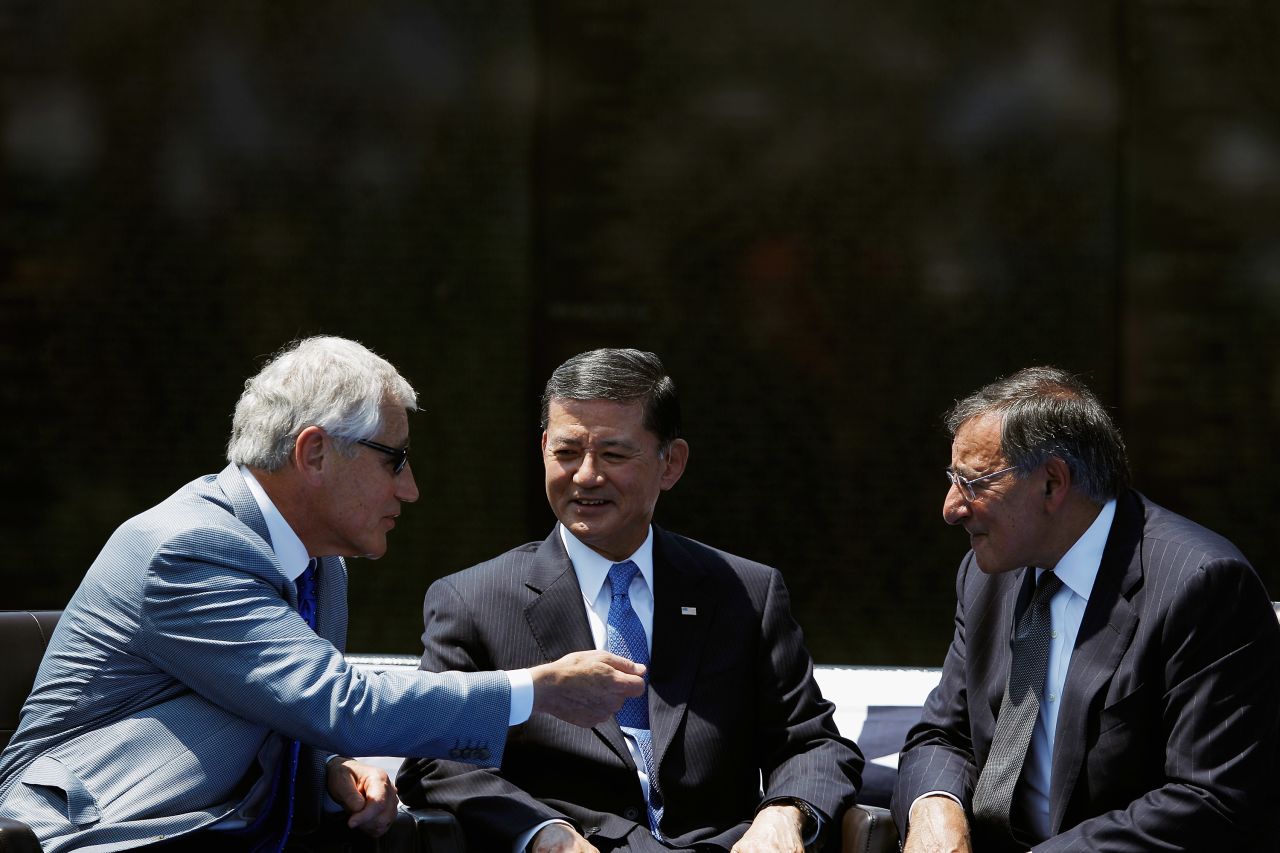 Hagel, from left, Veterans Affairs Secretary Eric Shinseki and Defense Secretary Leon Panetta attend a Memorial Day event at the Vietnam Veterans Memorial in Washington in May 2012.