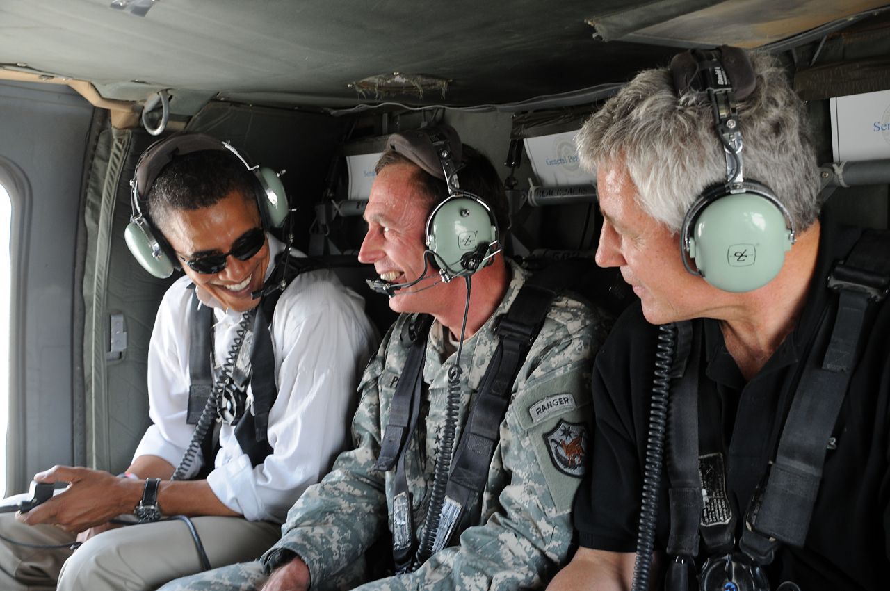 Gen. David Petraeus, center, flies with then-presidential candidate Barack Obama and Hagel on a July 2008 tour in Baghdad. Hagel joined Obama that year on his tour of parts of the Middle East.