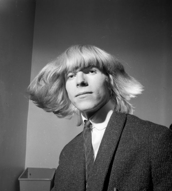 Bowie's hair and outfits shocked and awed for decades. Pictured, a young Bowie sports a Prince Valiant-esque do in March 1965, while he was still going by his birth name of Davy Jones. He changed his name to Bowie following the success of the Monkees and their lead singer Davy Jones. 