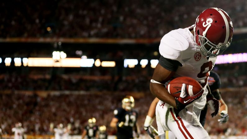 Alabama's Amari Cooper scores a touchdown in the third quarter against Notre Dame.