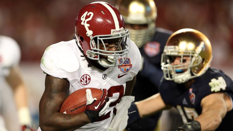 Alabama running back Eddie Lacy carries the ball during Monday's game against Notre Dame.