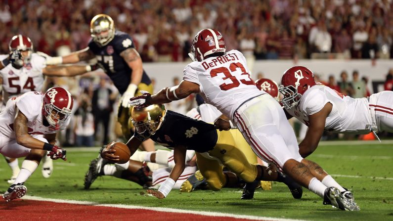 Notre Dame's Everett Golson dives for a touchdown in the third quarter against Alabama.