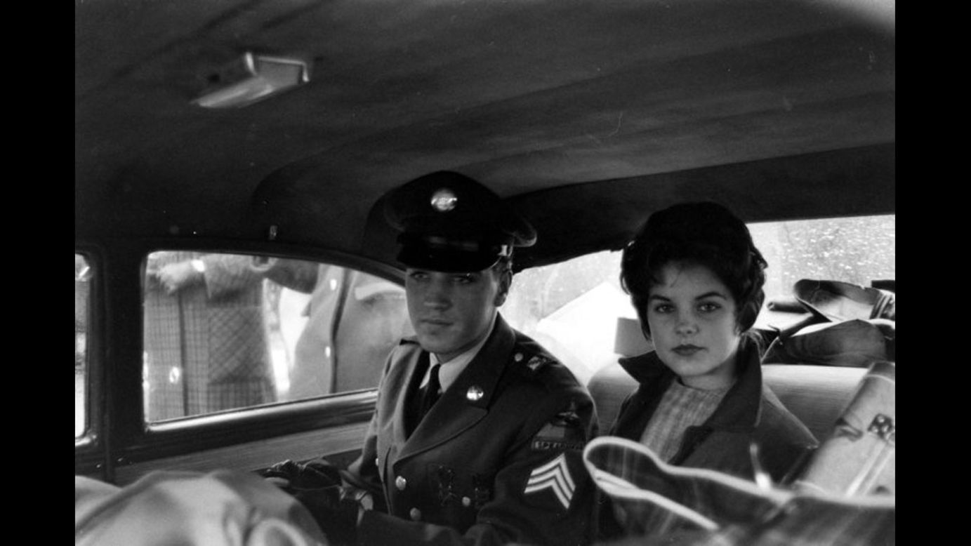 Elvis and Priscilla Beaulieu leave the house he and his family occupied in Bad Nauheim, Germany in March 1960.