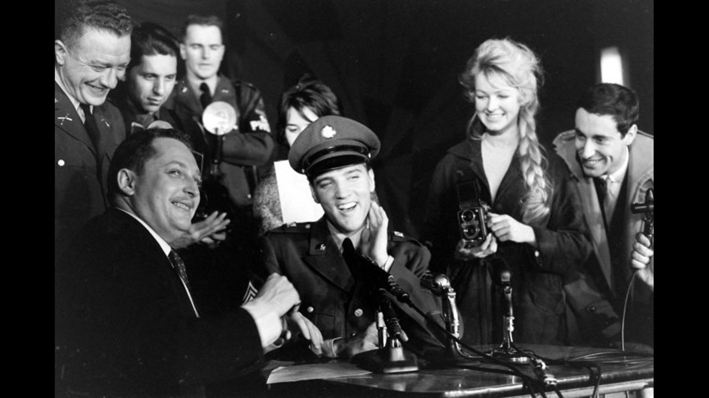 Sgt. Elvis Presley at a press conference before leaving Germany in March 1960.
