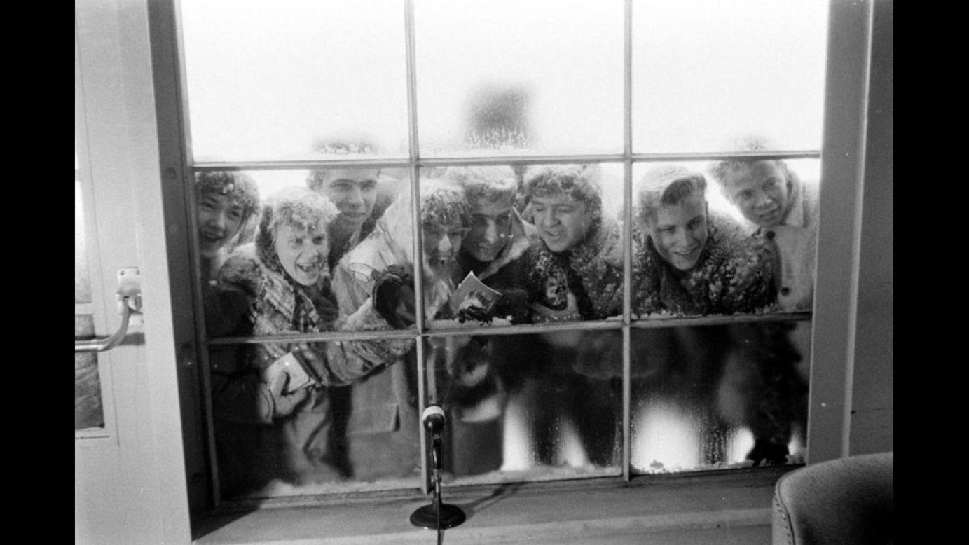 Elvis Presley fans at McGuire Air Force Base, New Jersey, in March 1960. <a href="http://life.time.com/culture/elvis-presley-life-photos-of-the-king-leaving-the-army-march-1960/" target="_blank" target="_blank">See the full gallery on Life.com.</a>