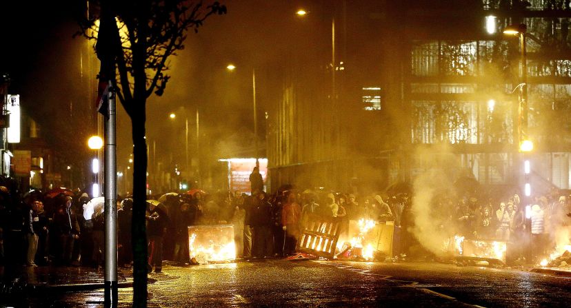 Protesters set up a burning roadblock in Belfast on Monday. 