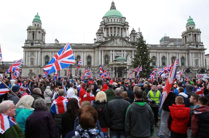 Loyalists march outside Belfast City Hall on Saturday, January 5.