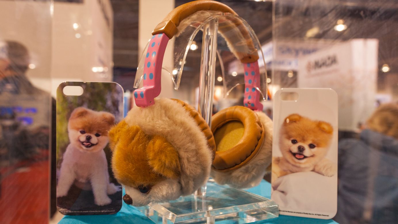 Boo, billed as "the world's cutest dog," is depicted on furry headphones and iPhone cases made by Audio Technology of New York. They will be available in stores in six weeks.