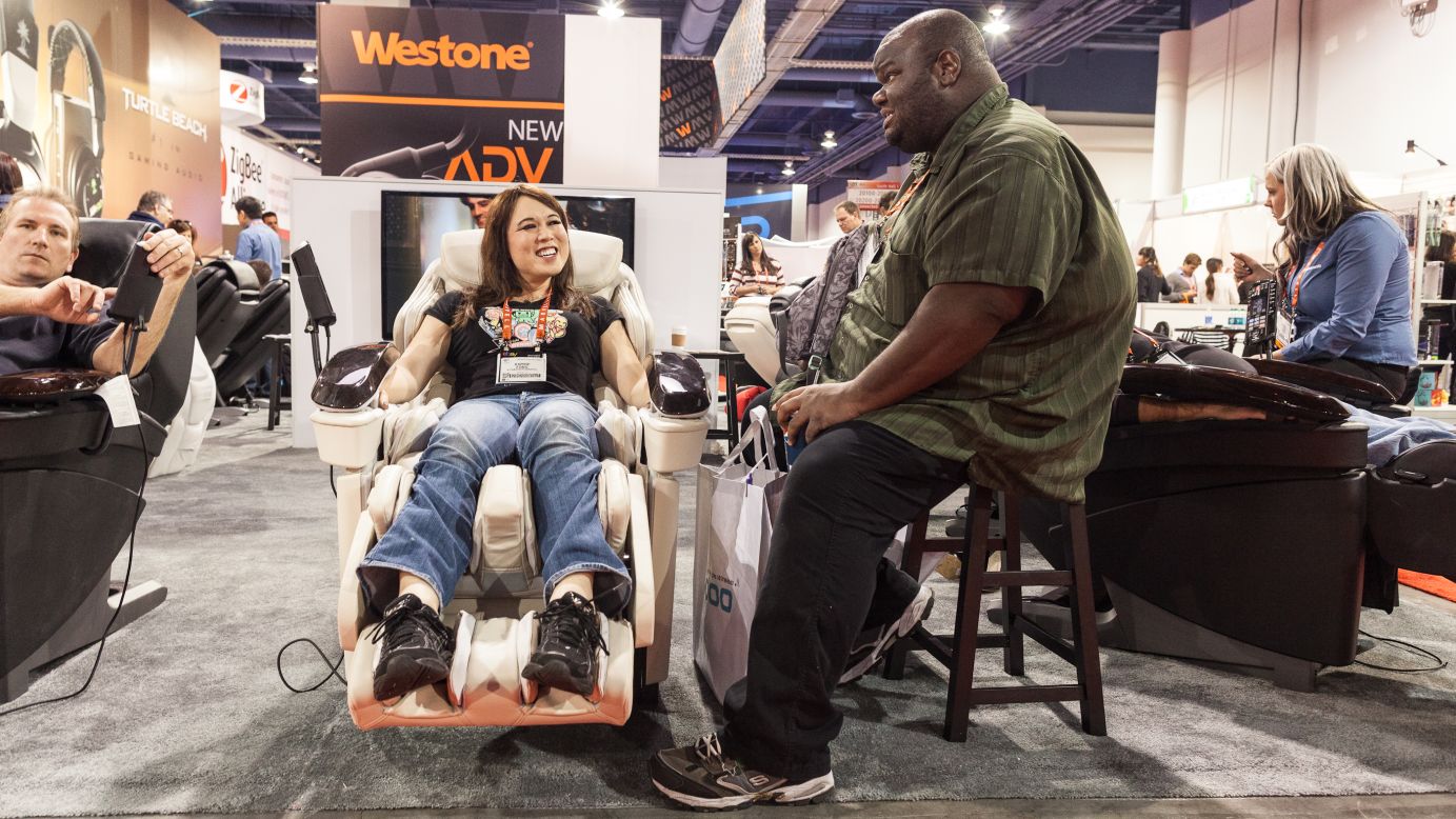 CES attendees enjoy the EP MA70 full-body heated massage chair by Panasonic. The chair sells for about $7,000.