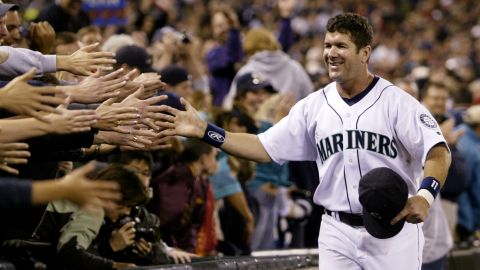 Edgar Martinez of the Seattle Mariners is greeted by fans as he takes a lap around the field during a post-game ceremony honoring his career as a Mariner on October 2, 2004.
