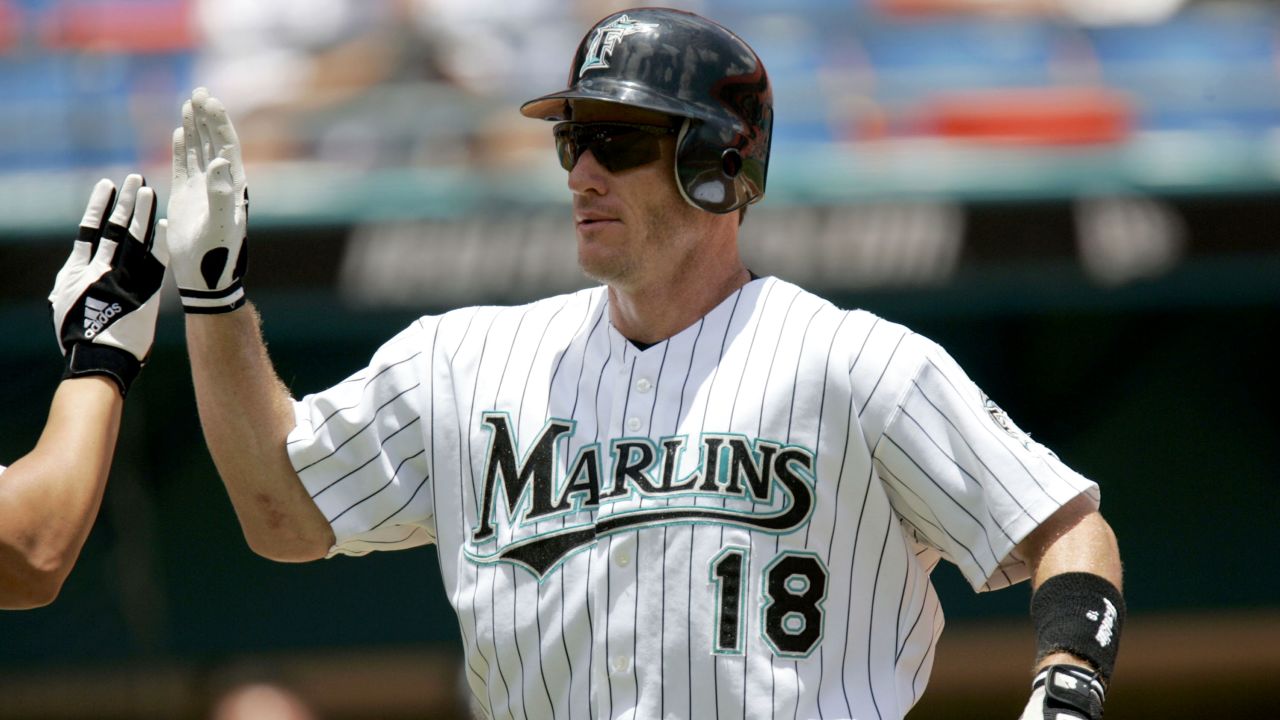 Left fielder Jeff Conine of the Florida Marlins celebrates a home run against the Philadelphia Phillies in Miami on July 29, 2004.