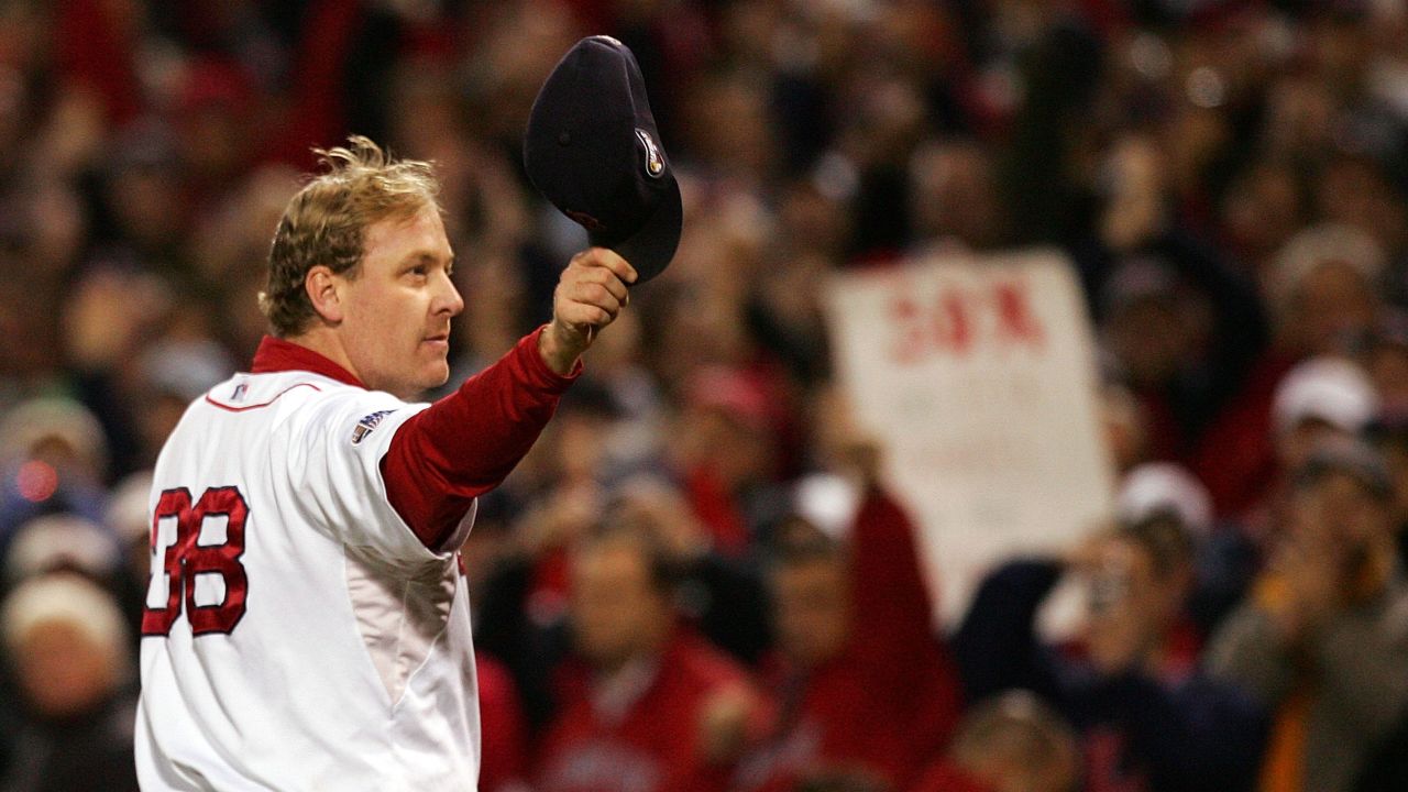 Curt Schilling of the Boston Red Sox tips his hat to the crowd as he leaves the game in the sixth inning against the Colorado Rockies during Game Two of the 2007 World Series at Fenway Park on October 25, 2007, in Boston. 
