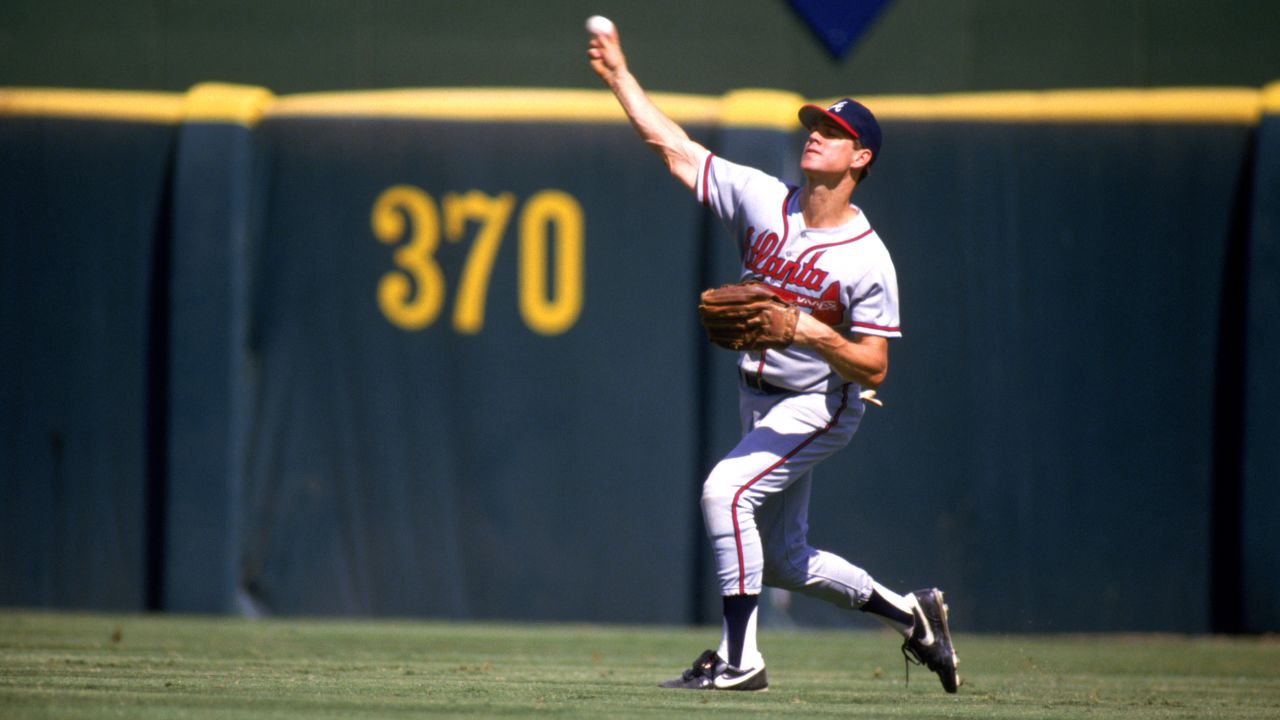 Dale Murphy of the Atlanta Braves throws the ball to the infield during a game against the San Diego Padres in 1987.