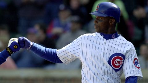 Fred McGriff of the Chicago Cubs celebrates during a game against the New York Mets at Wrigley Field in Chicago on April 10, 2002.  