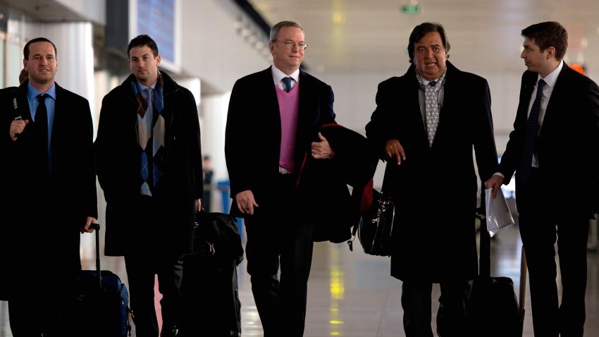 Former New Mexico governor Bill Richardson (2nd R) and Google chairman Eric Schmidt (C) arrive at Beijing airport from North Korea on January 10, 2013. Richardson and Schmidt met with reporters following their visit to secretive North Korea calling for greater Internet freedom for the welfare of its people. AFP PHOTO / Ed Jones (Photo credit should read Ed Jones/AFP/Getty Images) 