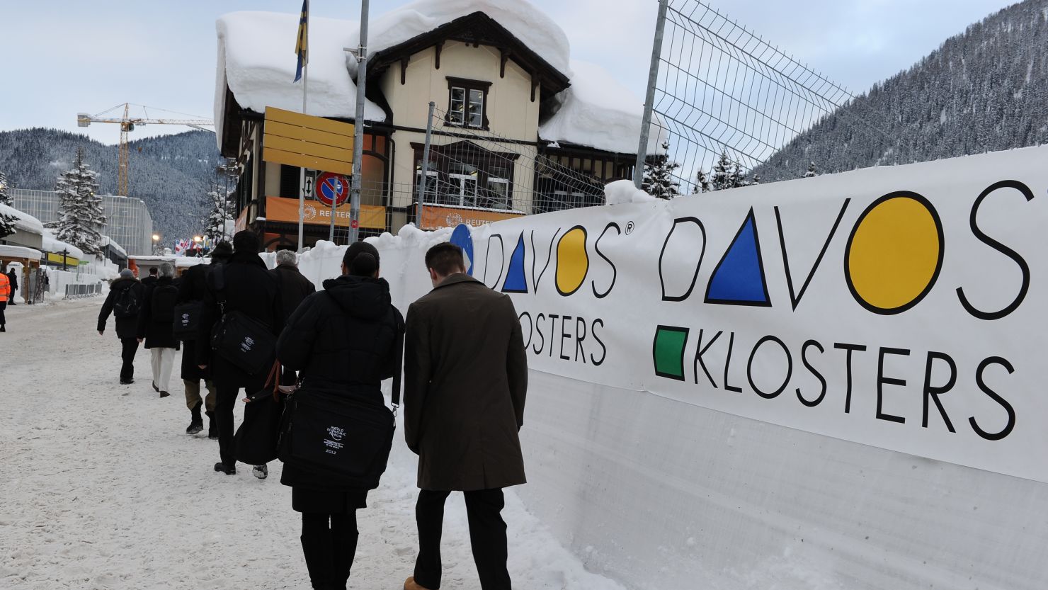 Delegates arrive at the congress hall at last year's World Economic Forum in the Swiss resort of Davos.