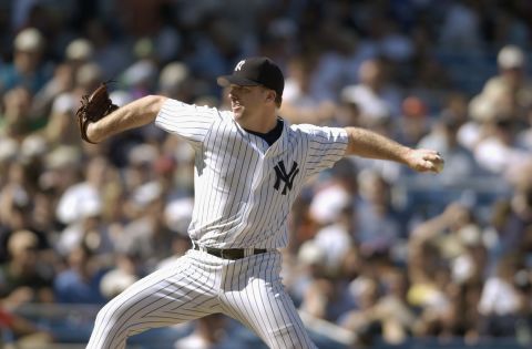 Mike Stanton of the New York Yankees pitches against the Boston Red Sox during a game at Yankee Stadium on June 2, 2002.