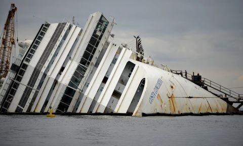 The Costa Concordia cruise ship lies aground near the port on Wednesday, January 9.
