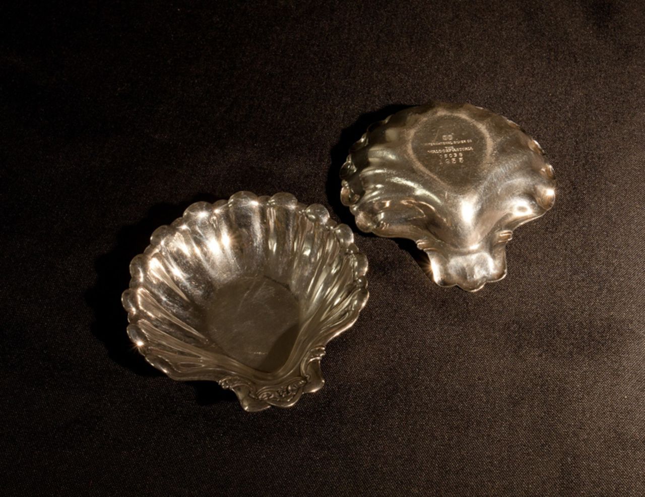 These shell-shaped nut dishes were used at the Waldorf's Peacock Alley bar in the late 1950's, providing snacks to late-night guests. The donor's father is thought to have spirited the stylish utensils away with him after a brief stay in the hotel during this period. 