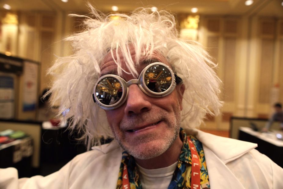 An exhibitor dressed as Doc Brown from the "Back to the Future" movies greets people at the Securifi booth at the Consumers Electronic Show in Las Vegas. The annual event is the largest gadget conference in the world. Check out photographer Zoran Milich's take on the action.