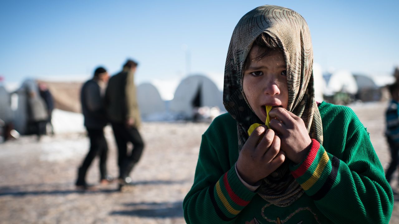 A boy plays with a balloon in a Syrian refugees camp in Azaz, near the Turkish border, on January 10.