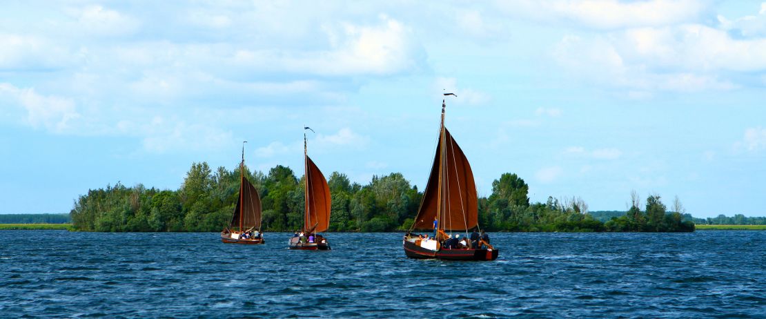 Boats sail on a lake near the town of Harderwijk in the Netherlands.