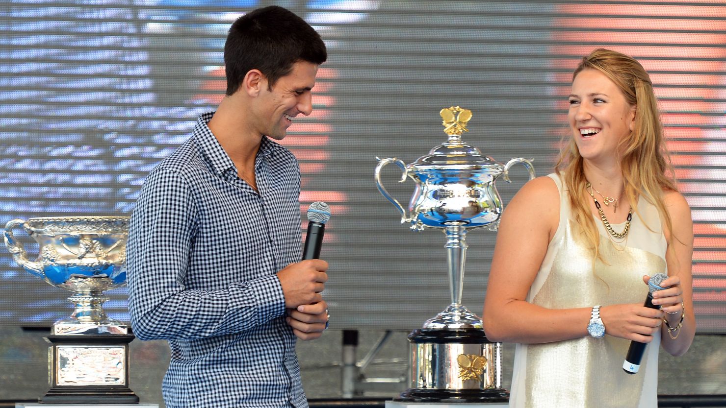 Defending Australian Open champions Novak Djokovic and Victoria Azarenka at the draw in Melbourne