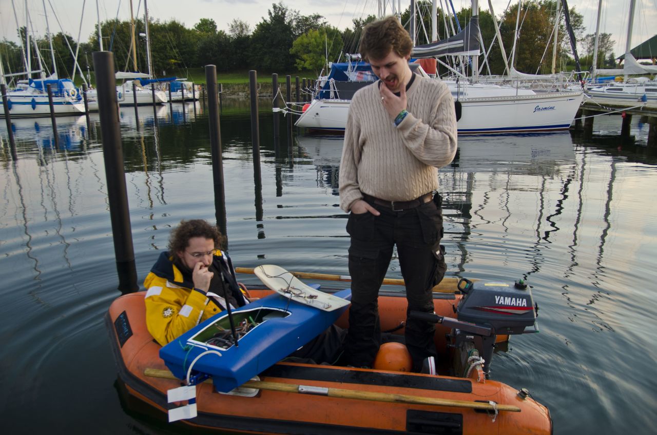 Repairs are made to the MS0x00, another Hackerfleet project that tests autonomous sailing technologies. The hacker group have also created an android app that charts the location of buoys and sea signs.