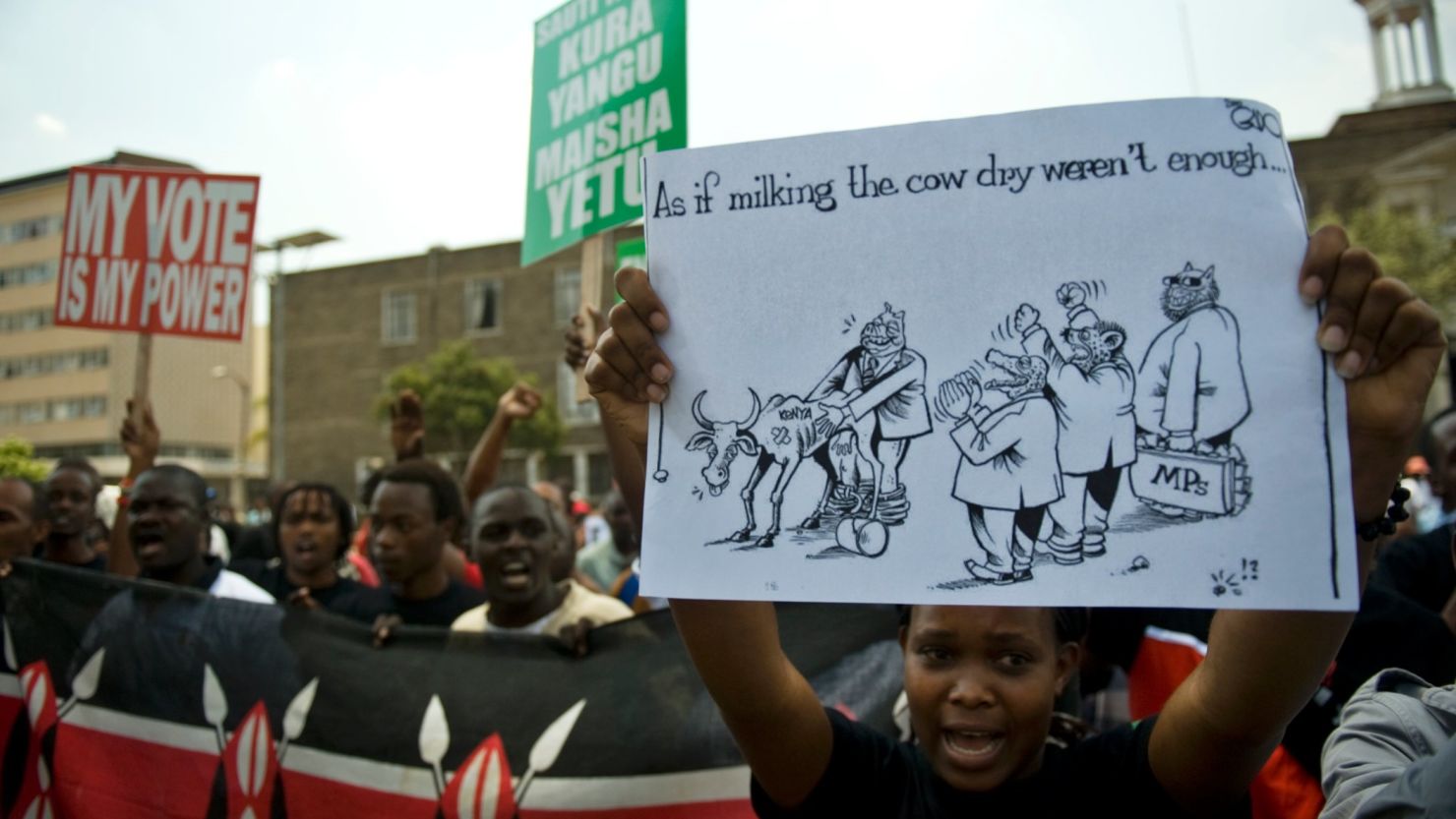 Demonstrators protest outside parliament in Nairobi on October 9, 2012 after lawmakers voted themselves a $110,000 bonus.