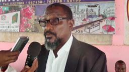 Mohamed Abdi Hassan speaks to journalists on January 10 in the central Somali region of Adado after announcing his retirement.