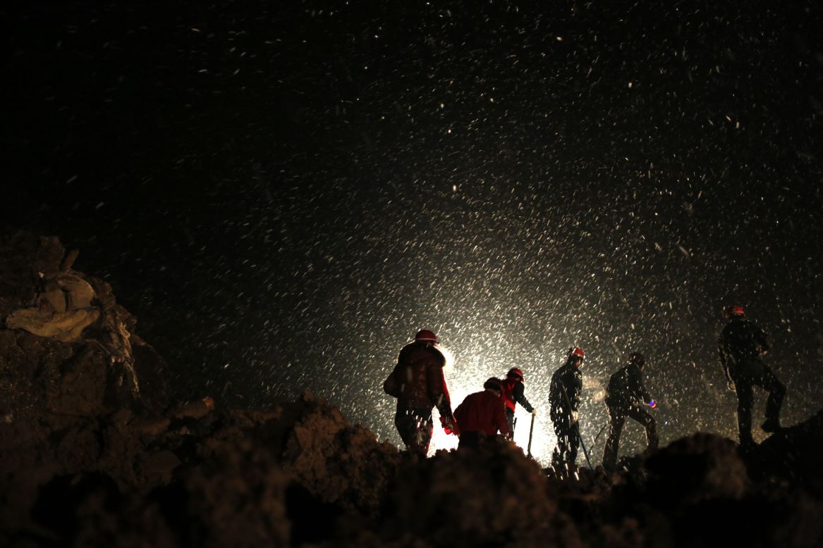 Rescuers on Friday, January 11, begin searching for missing residents in disaster-hit Gaopo village in southwest China. A landslide struck Friday morning, triggered by rain and snow that had saturated the largely rocky area for 10 days, Li Lianju, deputy director of the Yunnan Land and Resources Department, told state media.
